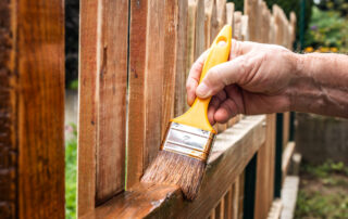 painting vs staining your fence